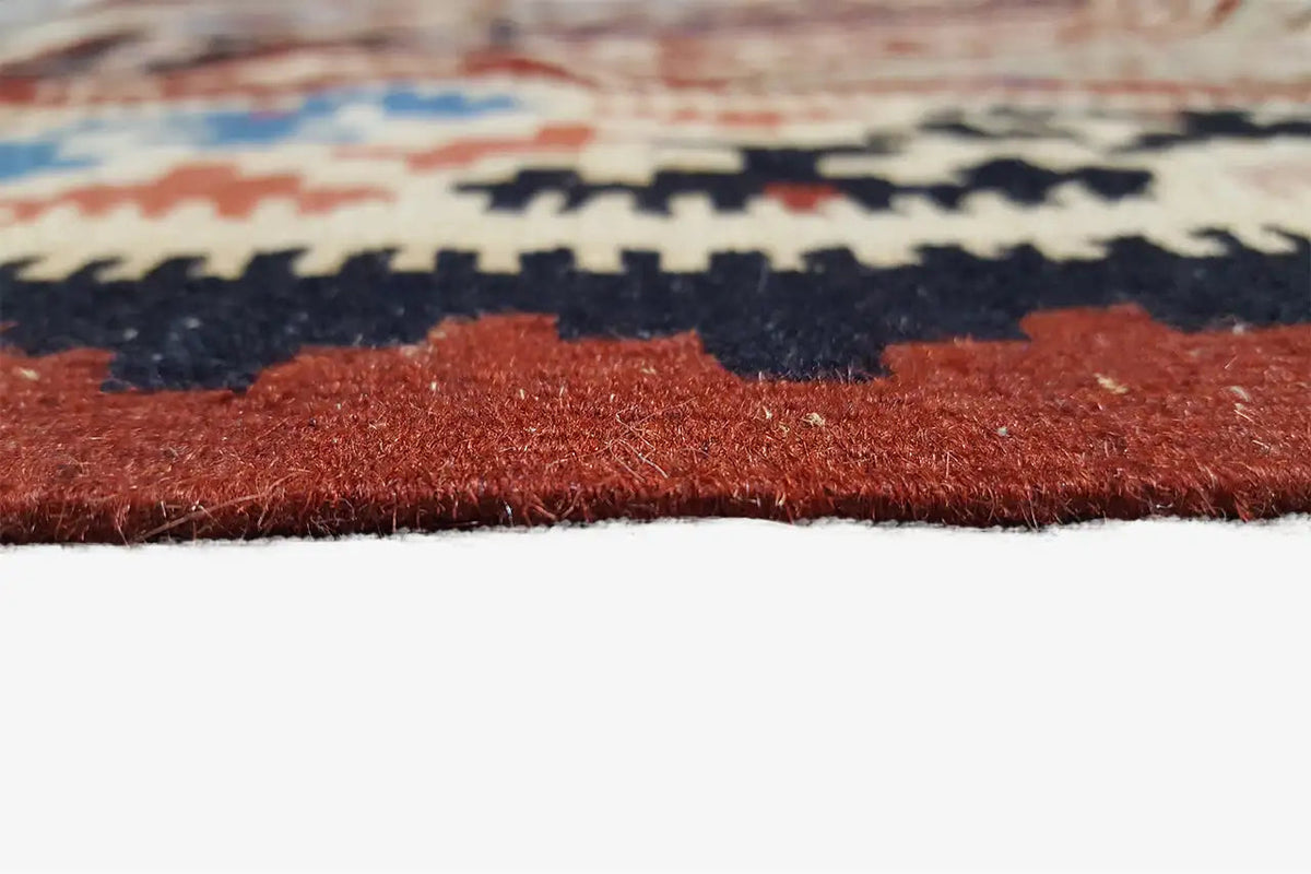 Close-up of the carpet surface with dense pile and colorful flecks