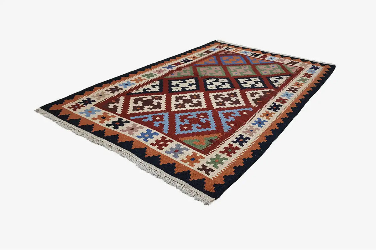 Colorful kilim rug with a large central ornament and an all-around border pattern