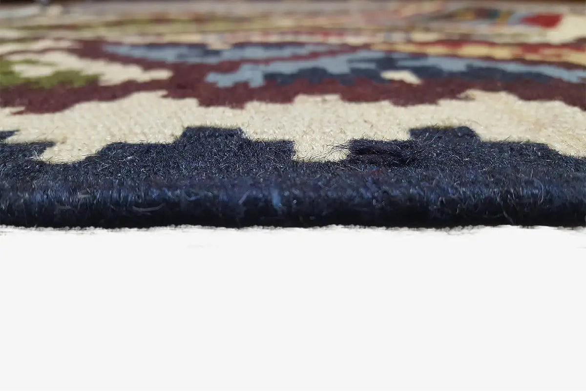 Close-up: Kilim edge with dark pile and short fringes