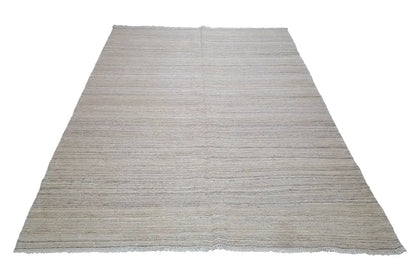 Flat-woven kilim rug, light beige with a subtle striped look, hemmed