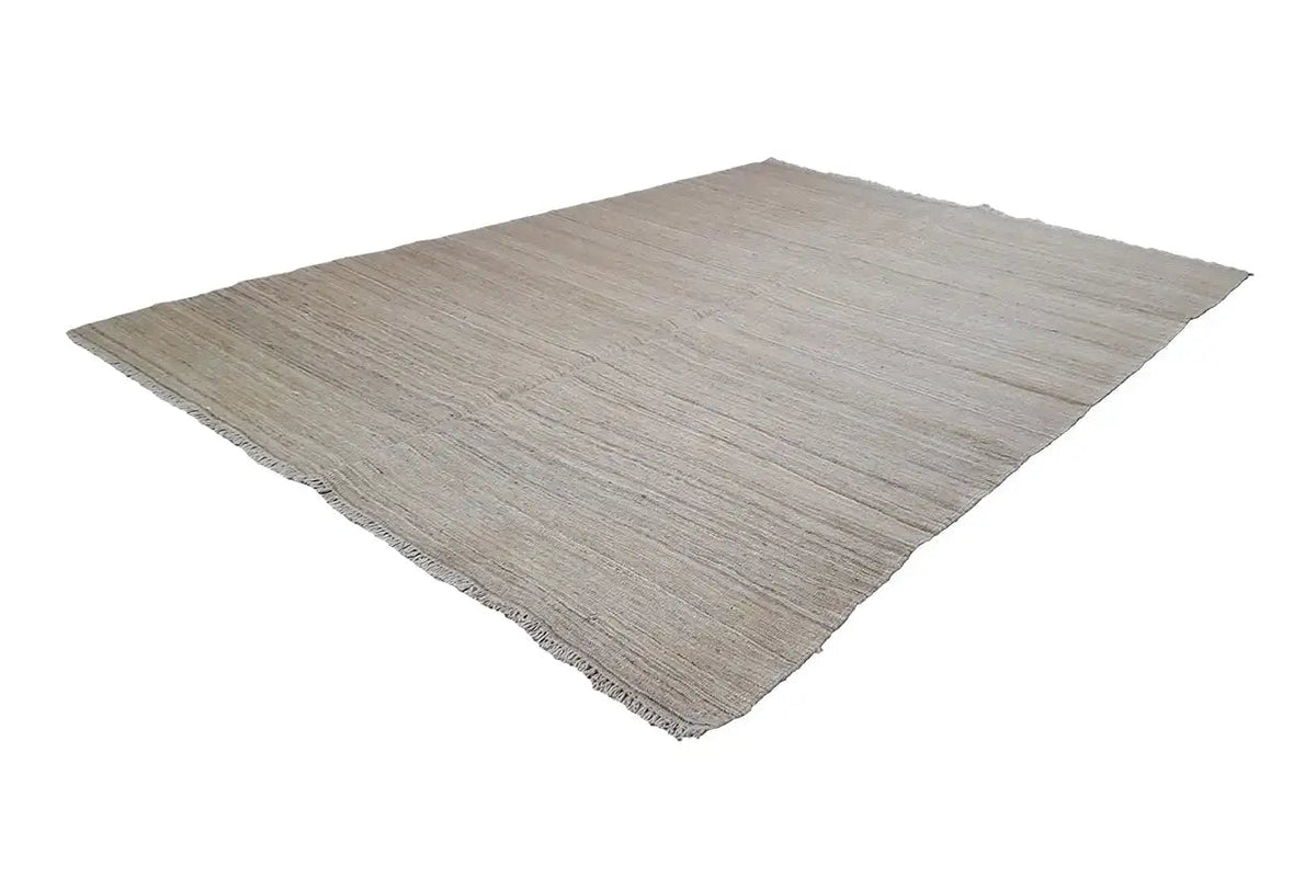 Kelim rug in light beige, second diagonal view, fine woven stripes, fringe