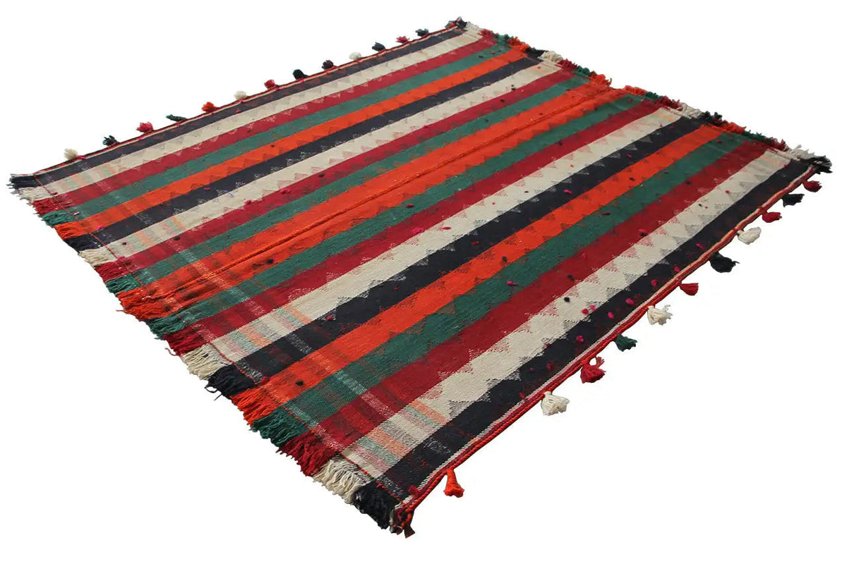 Jajim rug with a striped pattern in red, green, blue, and cream, with fringes.