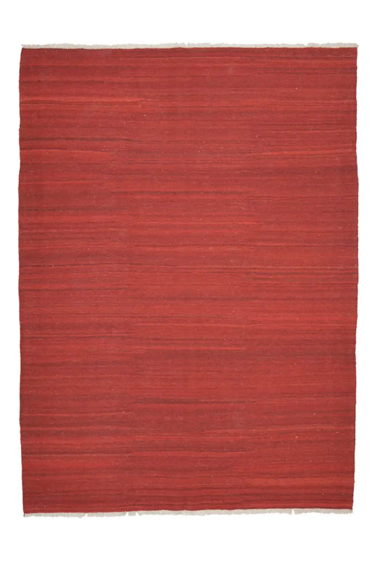 Red simple kilim rug with solid-color areas and a fine horizontal weave structure