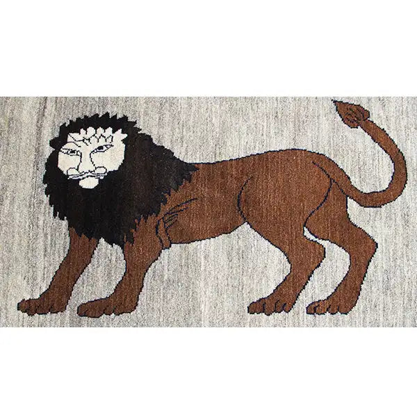 Close-up of Gabbeh rug: brown lion with a black mane and outstretched tail
