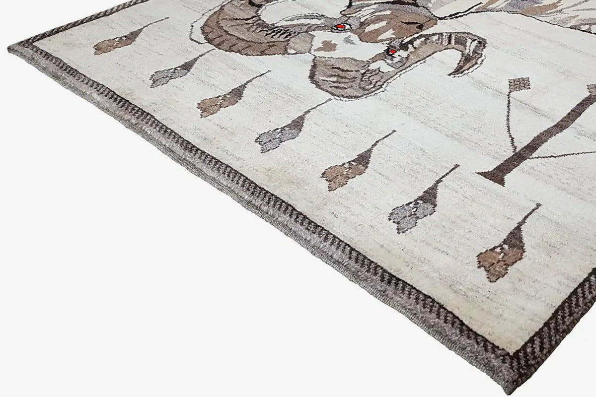 Gabbeh rug with a lion motif, cream-colored, brown ornaments and border along the edge