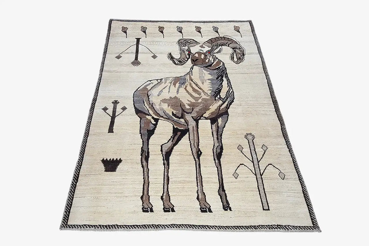 Gabbeh rug with standing lion figure, cream-colored, brown script ornaments and corner border