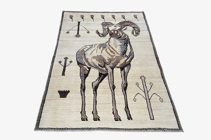 Gabbeh rug with standing lion figure, cream-colored, brown script ornaments and corner border