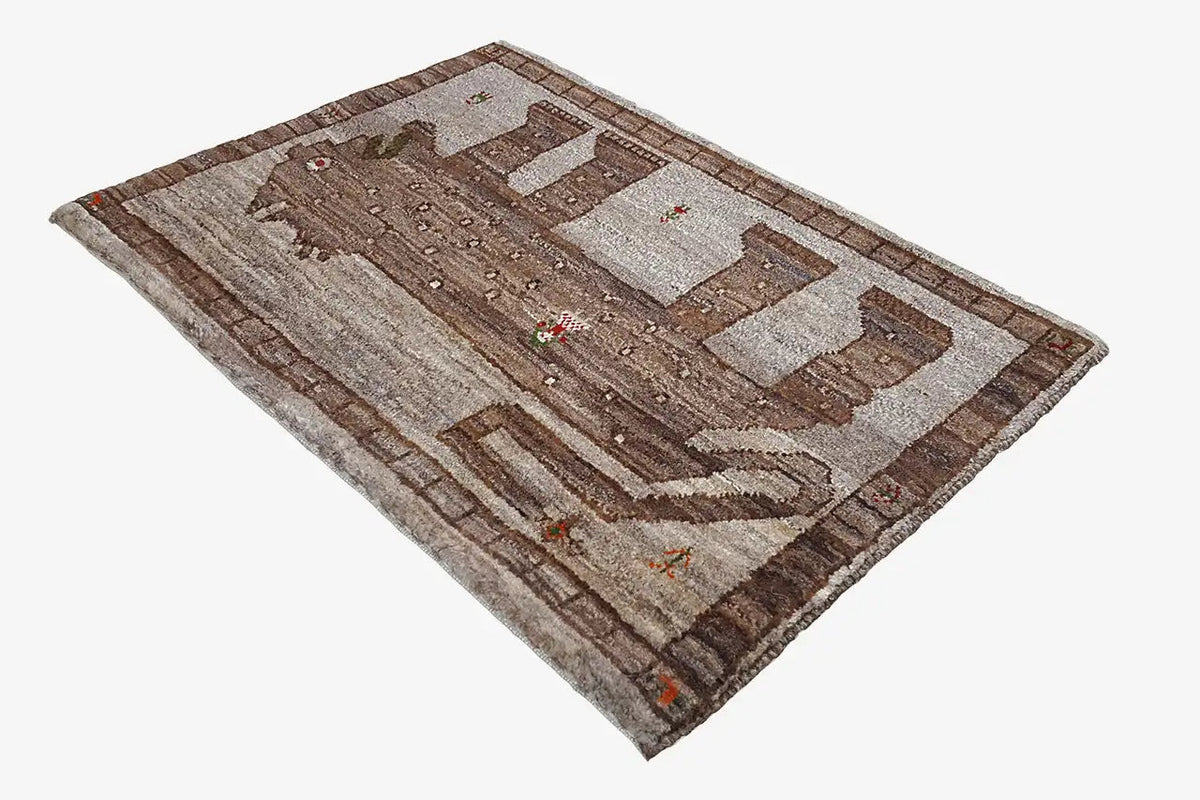 Gabbeh rug overall view with contrasting shades of brown and light-colored sections