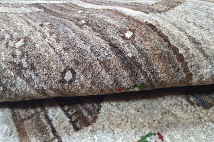 Gabbeh rug pile close-up, brown-beige with a dense, textured surface