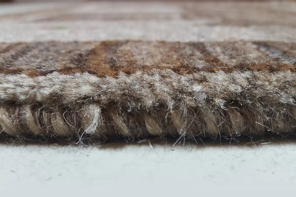 Gabbeh rug edge detail with dense pile and irregular texture