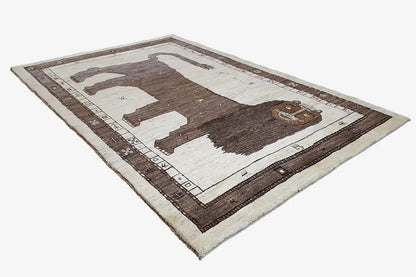 Gabbeh rug with lion motif, brown-and-white background, and dark border frame