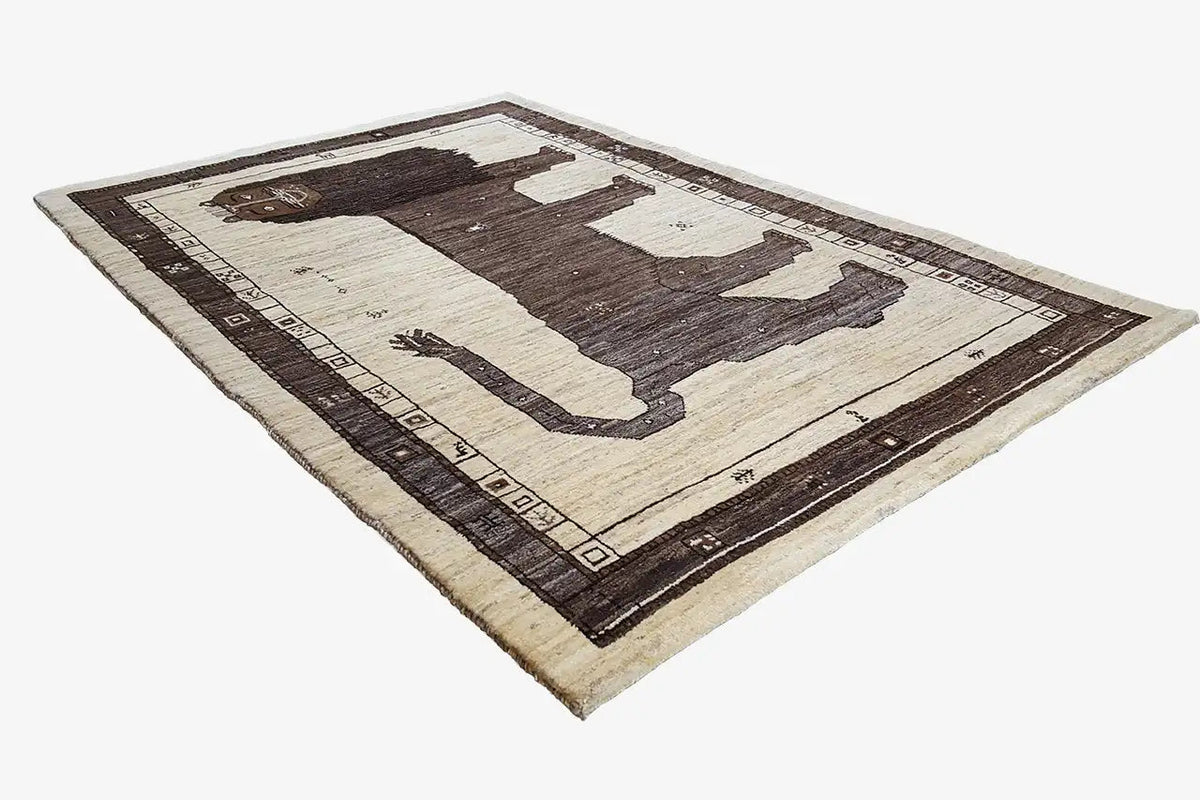 Gabbeh rug with a large lion motif and dark-framed border, brown and white