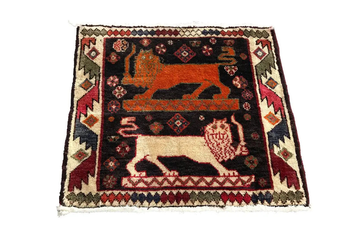 Poschti Qashqai rug with a large animal medallion and decorative border, 63×58 cm