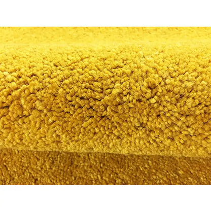 Mustard yellow Gabbeh rug, close-up of the dense pile and texture