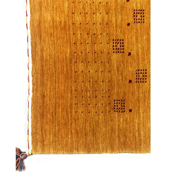 Gabbeh loom rug: front side with border, small square motifs, and tassels