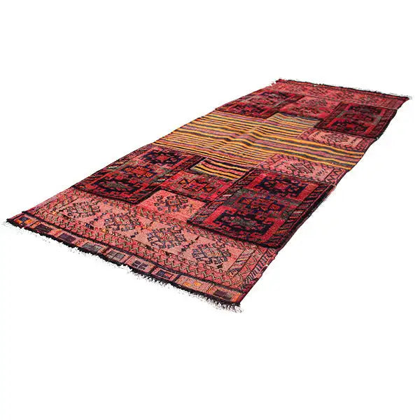 Kilim rug spread lengthwise, red-brown field pattern with beige and yellow striped zones