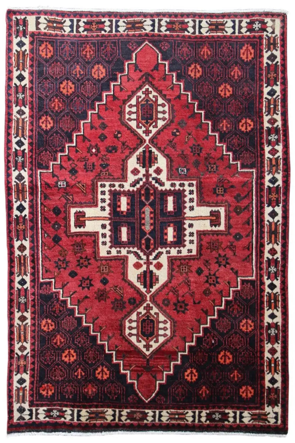 Rug with a red central field, geometric pattern, and white decorative borders