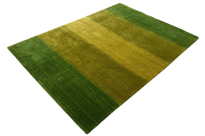Gabbeh rug 150x204 cm, green-yellow striped, shown folded diagonally