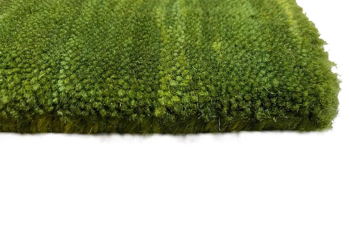 Gabbeh rug 150x204 cm close-up: dense green pile