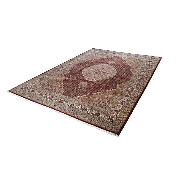 Rug with brown medallion and beige border in an ornamental pattern
