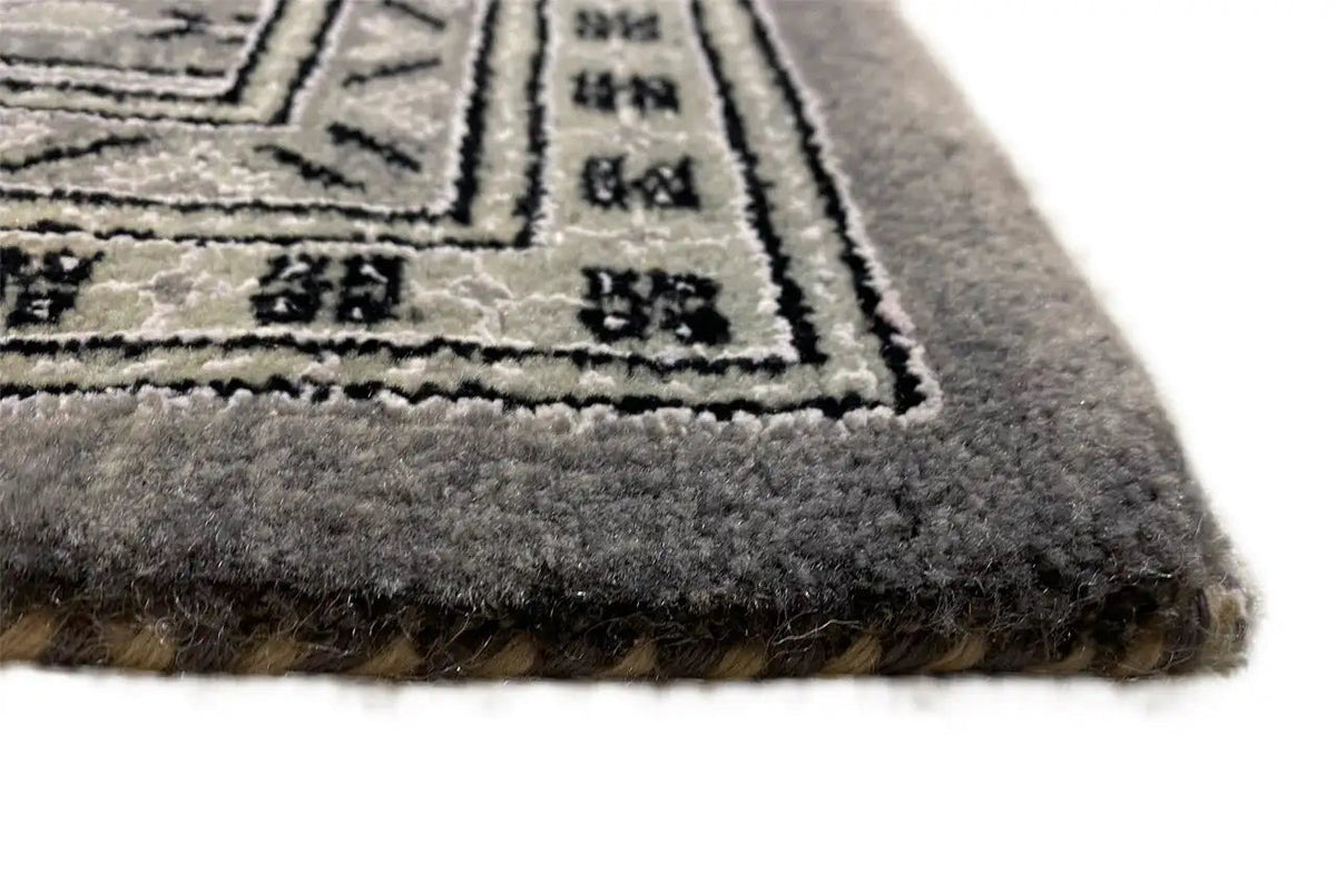 Teppich Botte Mir: pile with dense gray weave and bound border
