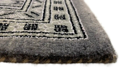 Teppich Botte Mir: pile with dense gray weave and bound border