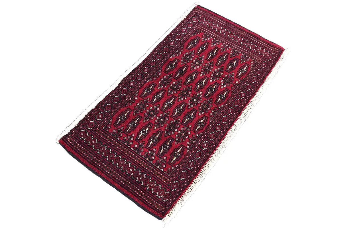 Turkmen carpet 110x51 cm, dark red with an ornamental border and symmetrical motifs