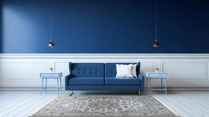 Rectangular Oriental rug with blue-and-white ornaments on a light background