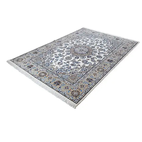 Beige rug with blue ornamental medallion and decorative border, rectangular