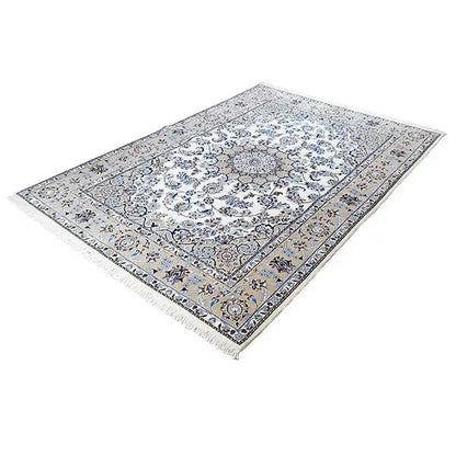 Rectangular oriental rug: cream-colored background, detailed blue medallion pattern