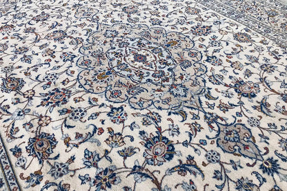 Detail of an Oriental rug: dense ornamental pattern in blue and beige
