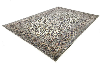 Beige rug with a blue border and an ornamental overall pattern, rectangular