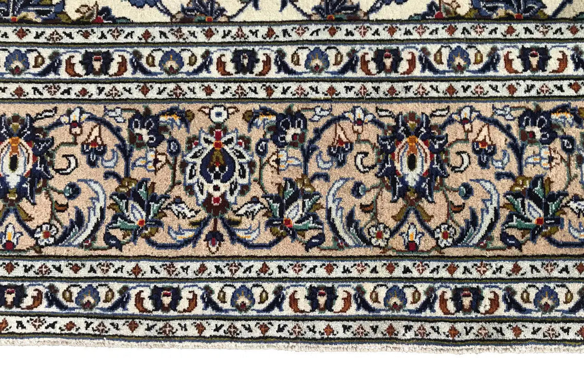 Carpet border with blue-and-gold ornaments and floral motifs, partial view