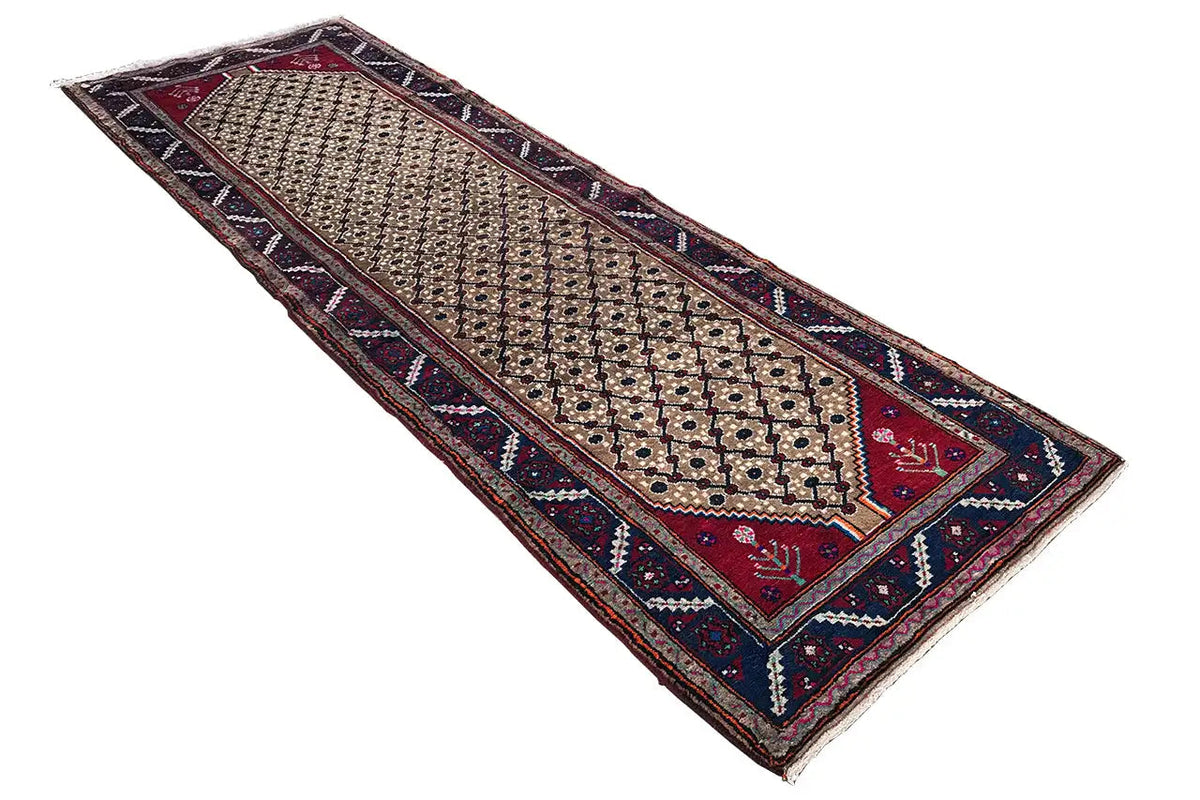 Beige Oriental runner rug with ornamental border, dark edge stripes, and burgundy accents