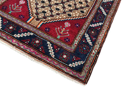 Oriental runner rug with a stepped edge, beige background, and dark decorative border