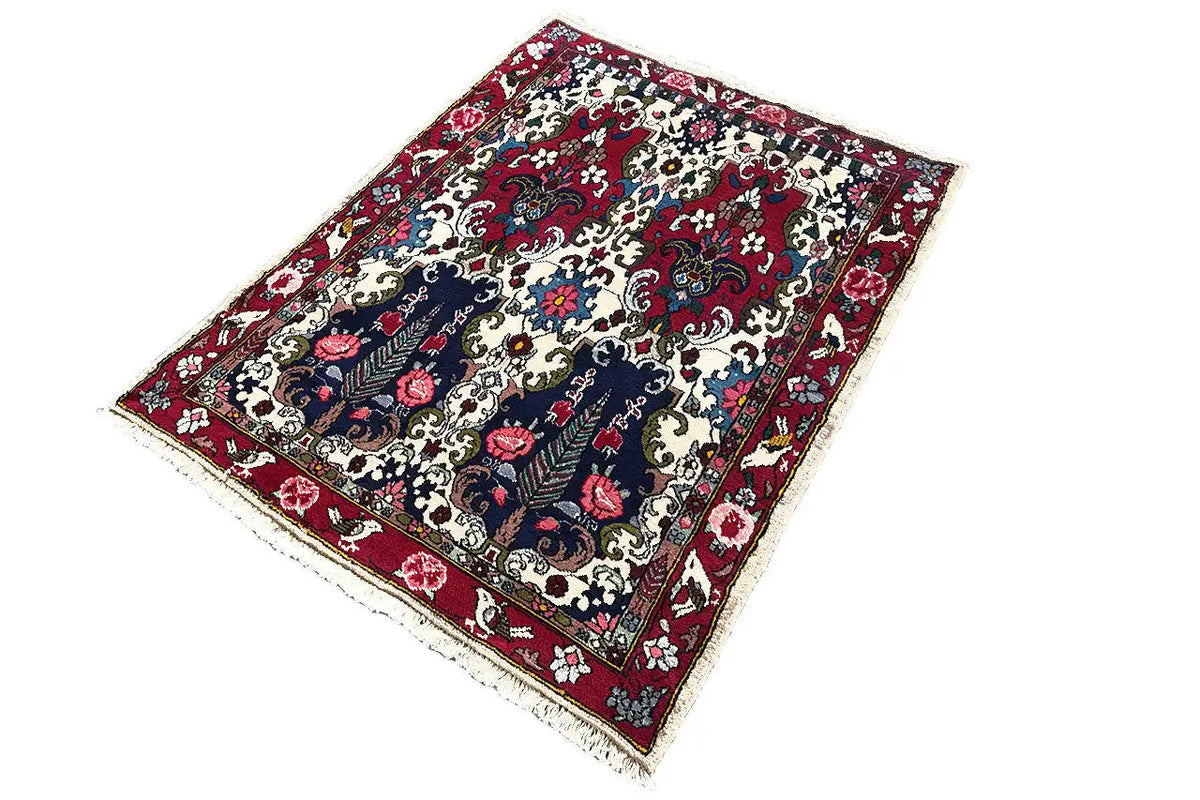 Bakhtiari carpet 142x104 cm, lying at an angle, dark blue-red with a decorative pattern