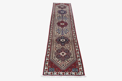 Rectangular runner with a Persian pattern in blue, red, and beige