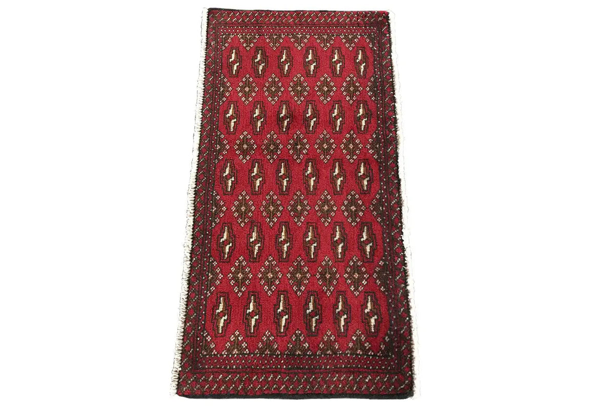 Poshti Turkmen rug (95x47 cm), red with diamond and elephant motifs, bordered
