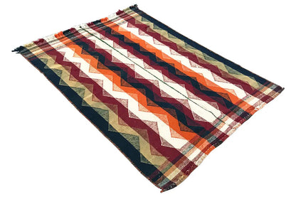 Jajim rug with a zigzag pattern in dark blue, orange, burgundy, and beige, corners with fringes