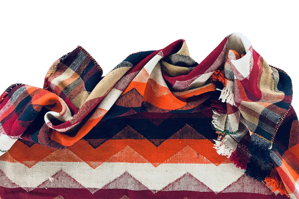 Folded jajim rug, zigzag pattern in dark blue, orange, burgundy, and beige