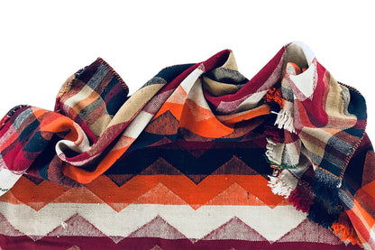 Folded jajim rug, zigzag pattern in dark blue, orange, burgundy, and beige