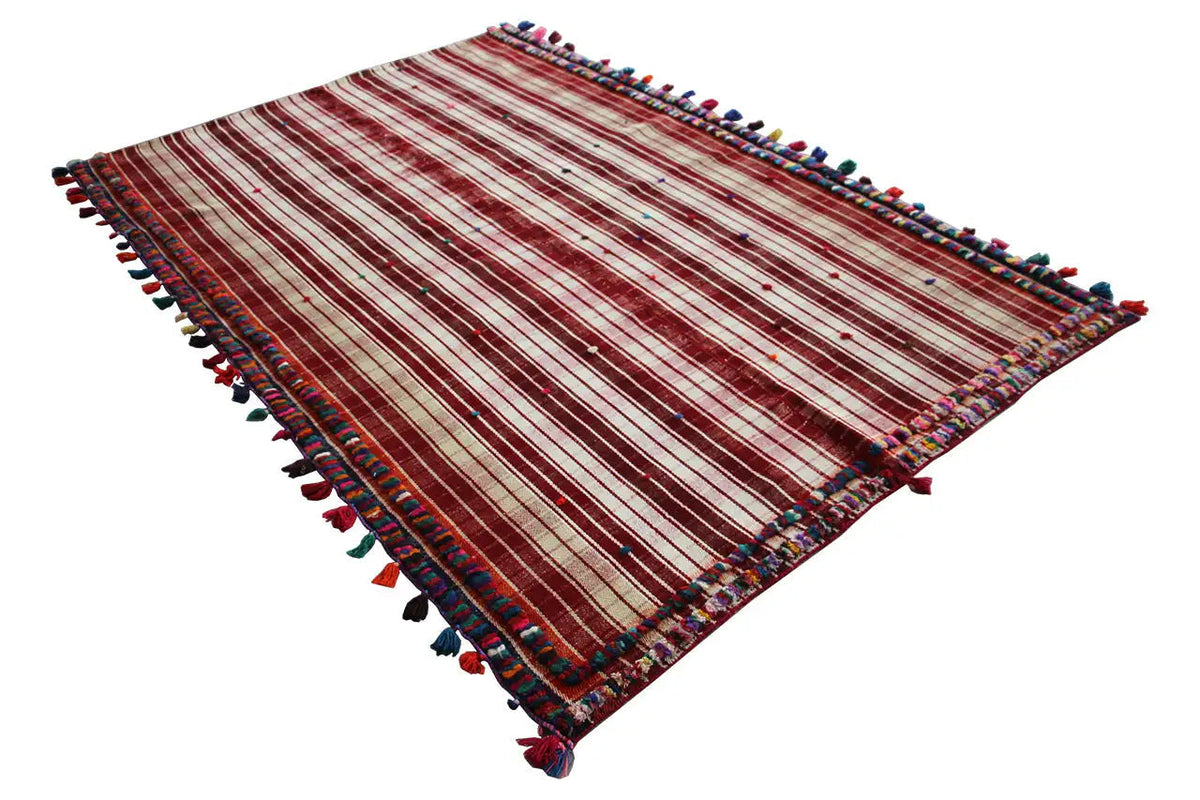Jajim rug with red-and-white stripes and colorful tassel trim