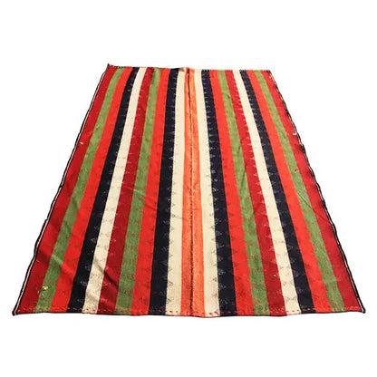 Jajim rug with wide stripes in red, green, dark blue, and cream, finished edges.