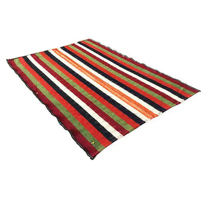 Jajim rug spread diagonally; striped pattern in red, green, cream, and dark blue.