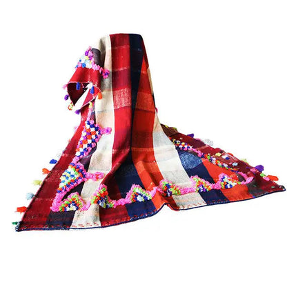 Colorful Jajim throw: woven striped pattern in red, dark blue, and beige with fringe
