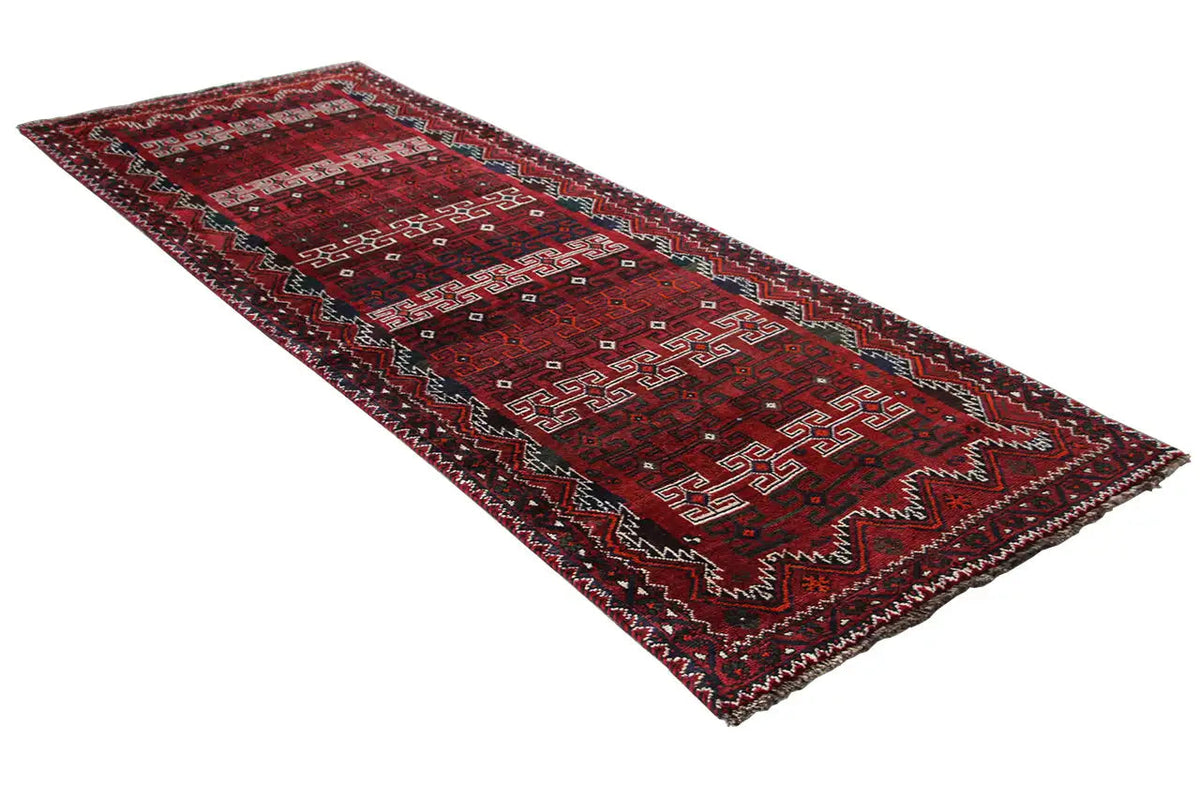 Qashqai runner with a red ornamental pattern, dark accents, and a decorative border, elongated