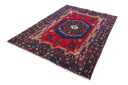 Sirjan rug (250×166 cm) with a red central medallion and multicolored border pattern