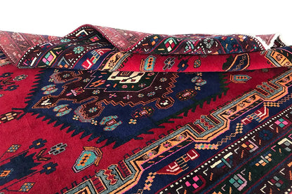 Sirjan carpet: view from the inside out with a red ground and blue border pattern