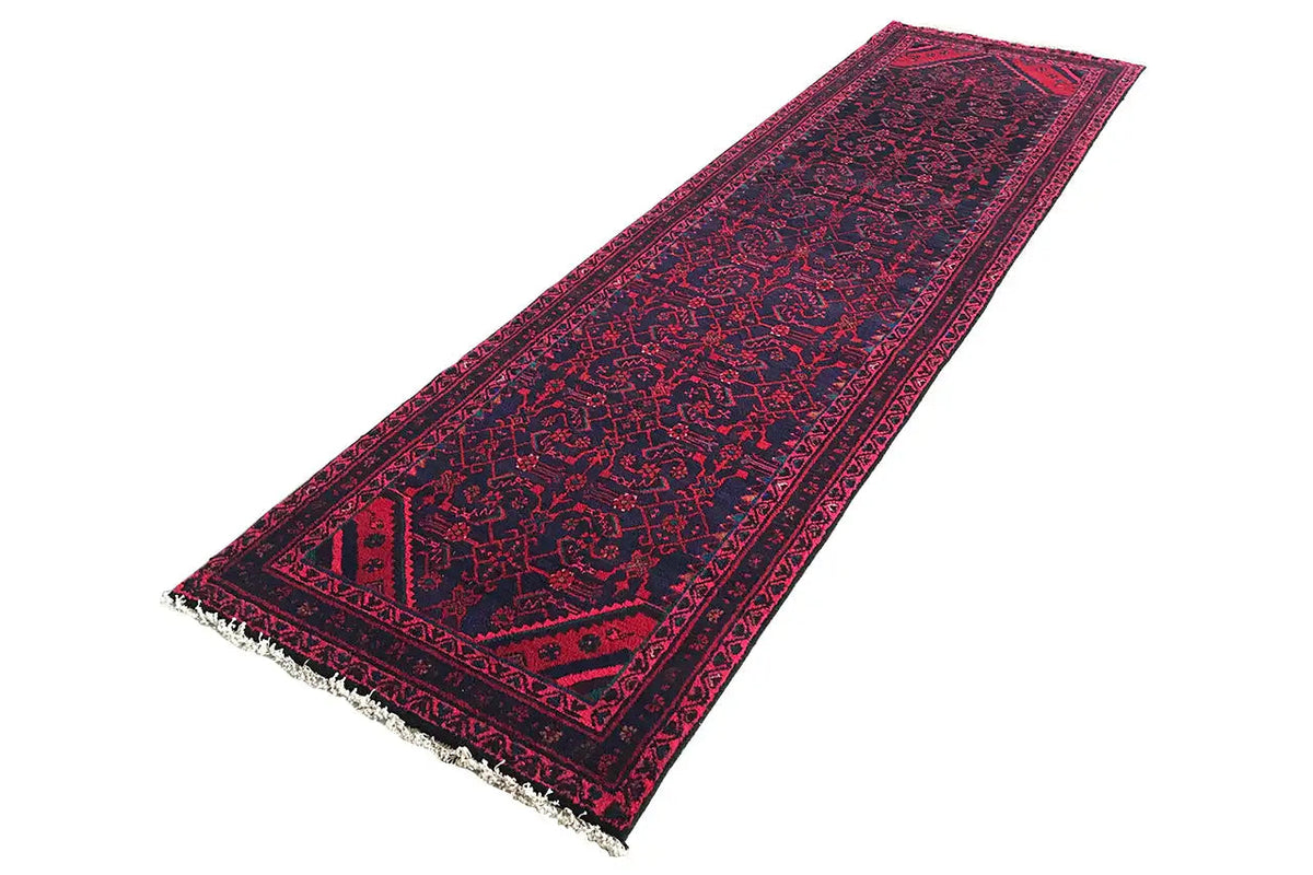 Hamadan rug with a burgundy ornamental pattern, dark blue lines, and short fringes