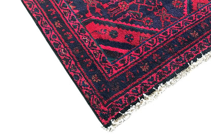 Hamadan runner rug with burgundy patterns, dark blue borders, and fringes